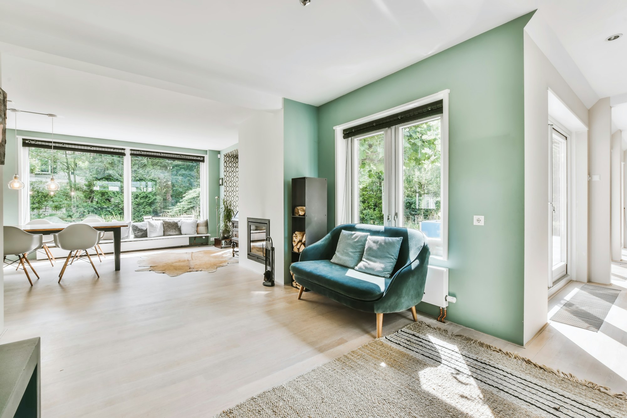 The interior of a beautiful dining room with large windows